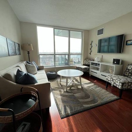 Elegant 2 Bed 2 Bath with 2 Balconies and Stunning Water Views - Photo 1