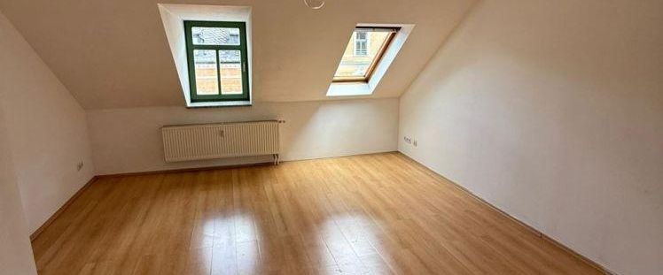 Günstige DG 3-Zi. mit Laminat, Balkon, Wanne und Dusche in sehr guter Lage - Foto 1