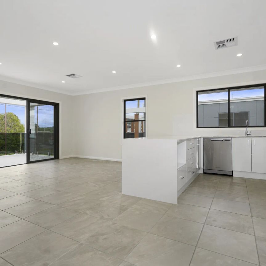 Designer Lakeside Living with Multi-Use Space - Photo 1