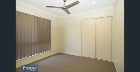 Modern 4 bedroom home in Riverbank estate - Photo 5