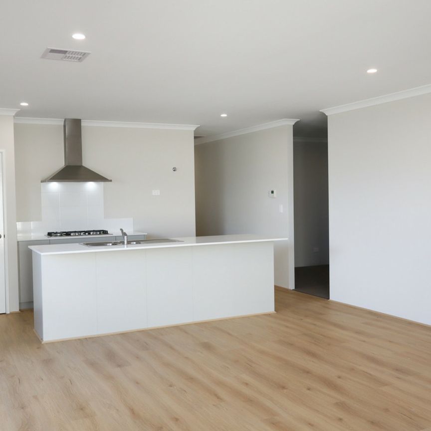 Live the Coastal Lifestyle in Brand New Four Bedroom Home! - Photo 1