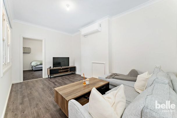 Modern & Charming 3-Bedroom - Photo 1