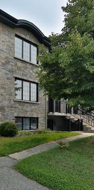4 1/2 STYLE CONDO/ LAVAL CHOMEDEY - Photo 1