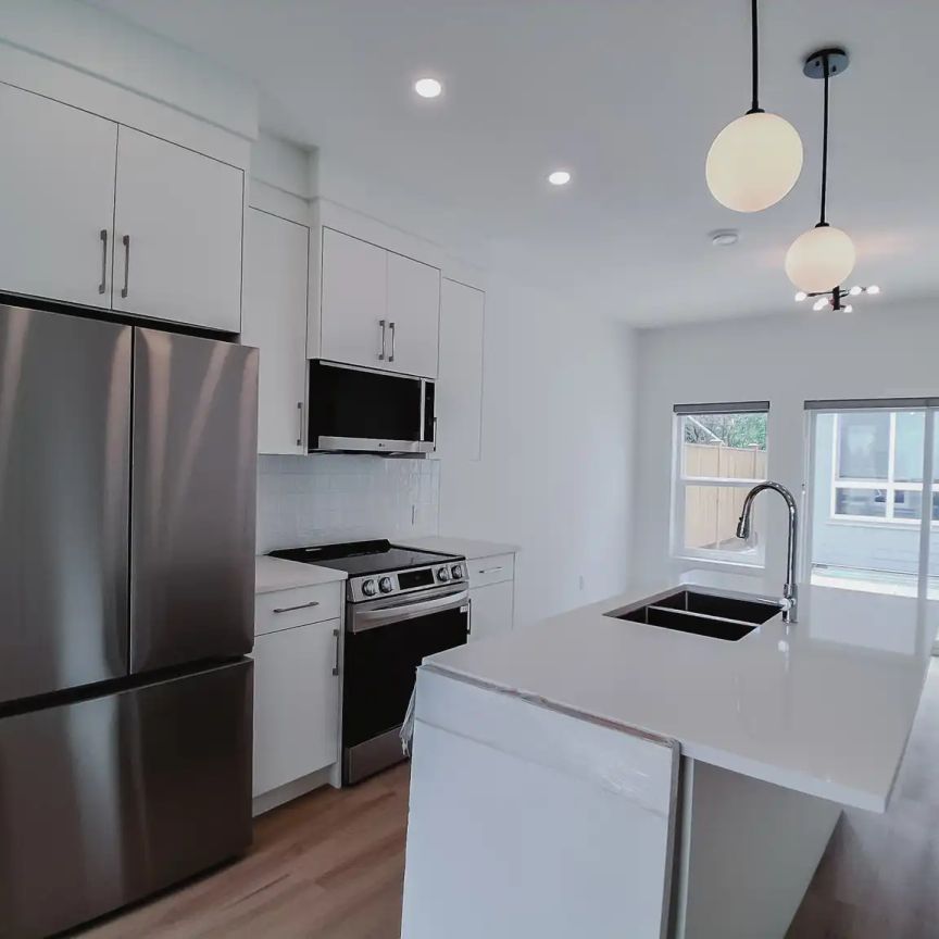 2539 Morley Trail NW (8-plex), Calgary - Unit 101 — 3 Bedroom - Photo 1
