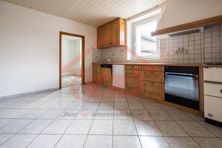 Appartement de 2.5 pièces au rez-de-chaussée - Photo 2