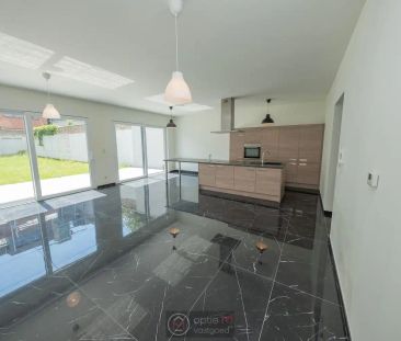 RUIM GELIJKVLOERS APPARTEMENT MET 2 SLPKS EN TUIN MET TERRAS. - Foto 3