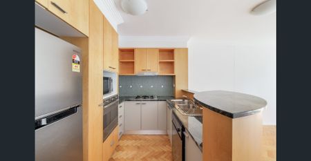 Renovated home with peaceful rooftop views - Photo 5