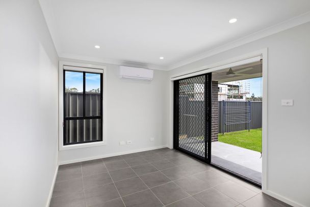 Beautiful Built Home with Alfresco Living! - Photo 1