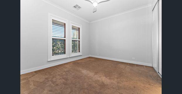 Large Four Bedroom family Home in Perfect Location - Photo 1