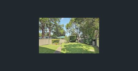 Comfortable family home with fully fenced great yard space - Photo 4