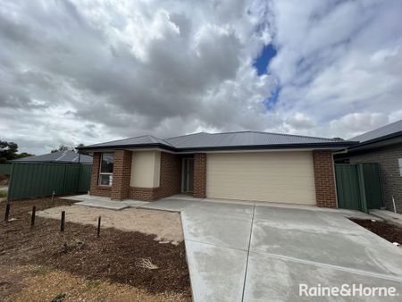 Four Bedroom Home in Evanston Gardens! - Photo 2