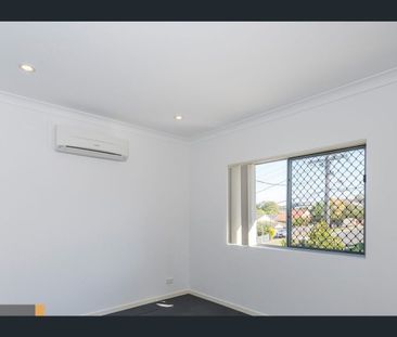 Spacious 2 Bedroom units, close locations to all amenities - Photo 1