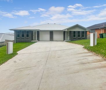 Brand New Duplex Style Family Home - Photo 1