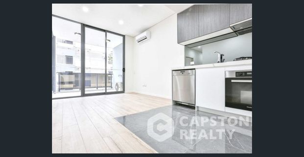 Nearly New Sun Filled Two bedroom available for rent - Photo 1