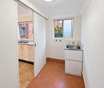Spacious Two-Bedroom Apartment with Balcony & Two Car Spaces - Photo 4