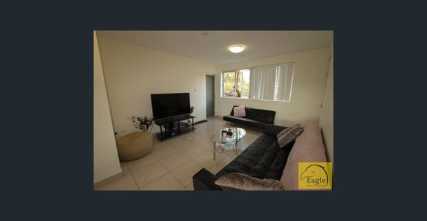 Spacious unit with modern kitchen - Photo 1