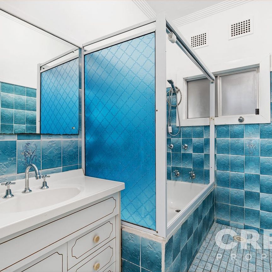 CUTE AND CONVENIENT FAMILY HOME - Photo 1