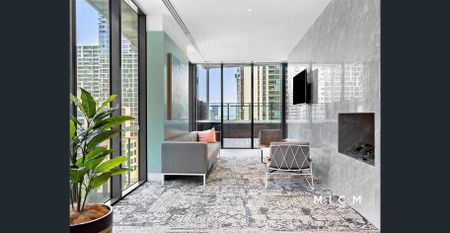 Experience this Luxurious 2 bedroom Apartment located in the "Melbourne Grand Building" - Photo 2