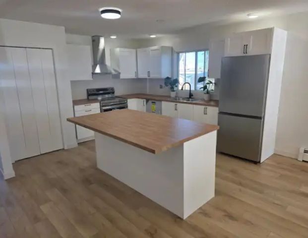 Fully Renovated 4-Bedroom Suite in Allendale - Pet Friendly! | 10426 65 Avenue Northwest, Edmonton - Photo 1