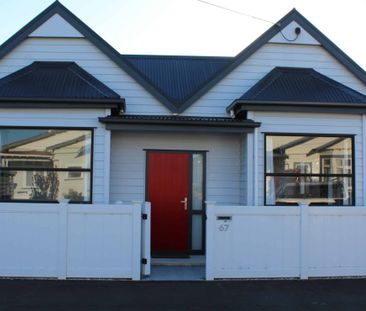 Gorgeous renovation behind the Red Door - Photo 3