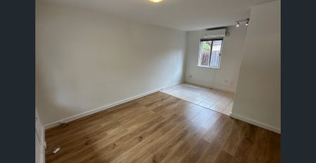 Charming 1-Bedroom Apartment in Great Location - Photo 4