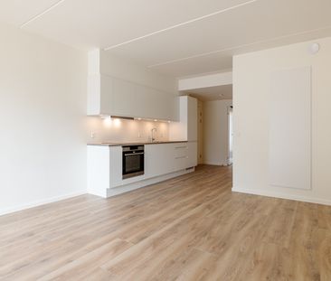 Nyopført lejemål i flot og moderne boligkompleks - Photo 3