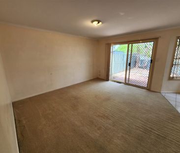 This comfortable 2-bedroom townhouse is in a perfect location - Photo 2