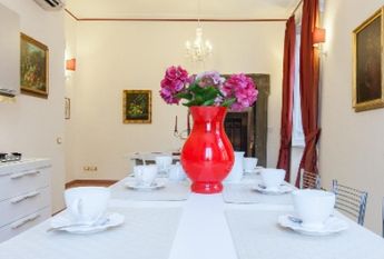 Center-Historic Jewish Quarter: Elegant apartment situated in beautiful Palazzo Nobiliare. Entrance, spacious living with original wood frescoed ceilings, large modern dining and kitchen, 4 bedrooms, 4 Baths, small terrace. #1527