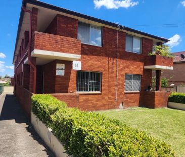 CONVENIENTLY LOCATED TWO BEDROOM UNIT - Photo 1