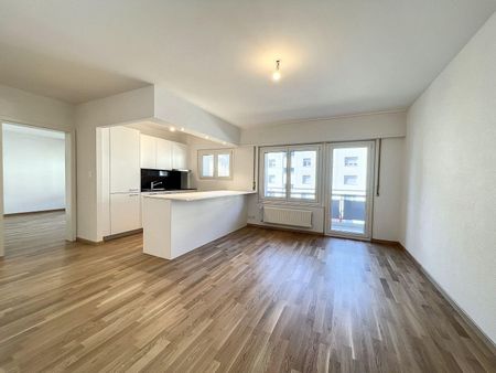 Appartement lumineux de 3.5 pièces au 2ème étage situé dans un quartier calme et verdoyant. - Photo 2