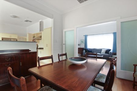 Charming Character Meets Modern Comfort in a Sought-After Suburb! - Photo 2