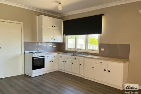 NEAT AND TIDY HOME - Photo 2