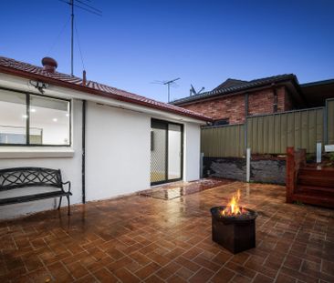 Stylish Family Living in a Peaceful Location - Photo 1