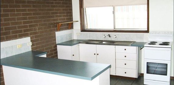 Low Maintenance Unit! - Photo 2