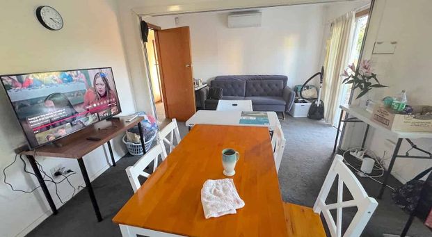 A fully fenced home in a building of two dwellings - Photo 1