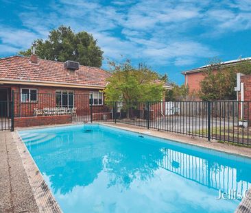 Four Bedroom Home with Heated Pool - Photo 6