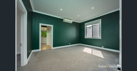 Well-Appointed Home with a Large Flat Backyard in a Central Location - Photo 3