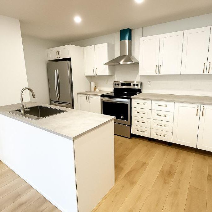 4 1/2 Condo rénové à louer près du boulevard St-Jean, dans l'ouest de l'île - Photo 1