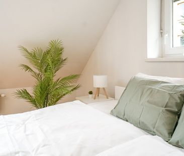 Charmante Dachgeschosswohnung in ruhiger Lage - Photo 4