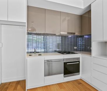 Modern & Stylish 1-Bedroom Apartment with Study & Parking - Photo 3