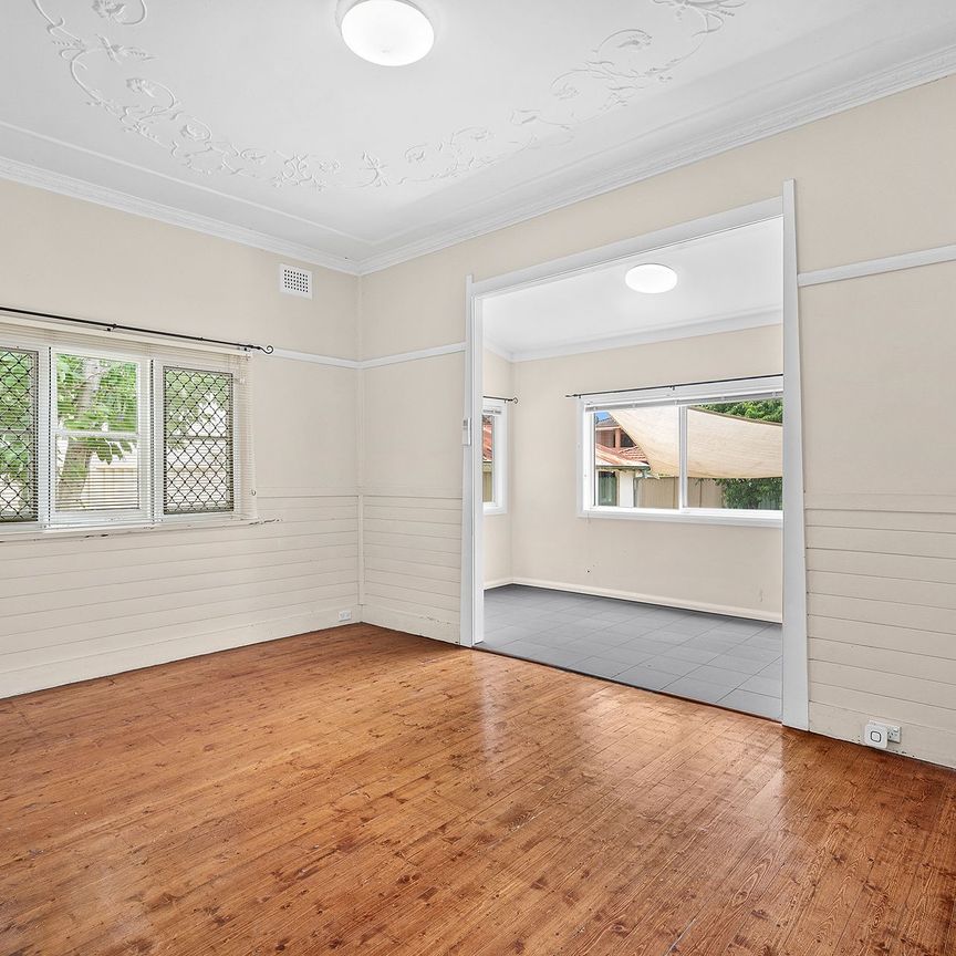 Three-Bedroom Home with Spacious Backyard - Photo 1