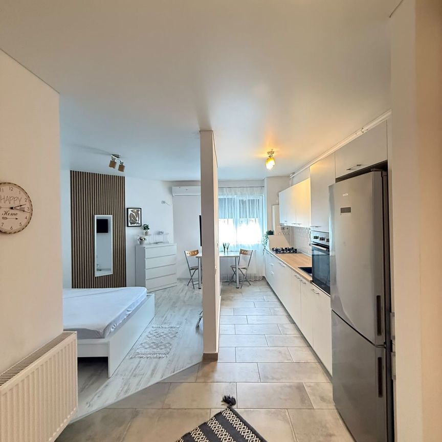 GARSONIERĂ MODERNĂ – STR. TINERETULUI 35 | LOC DE PARCARE INCLUS - Photo 1