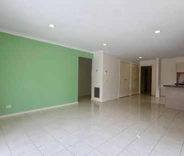 Modern Family Home with Dual Living Areas - Photo 1