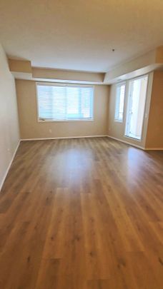 FREE 1 month rent 2-Bedroom + Den, 2-Bathroom Condo - Photo 1