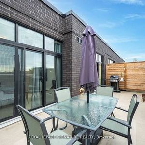 Luxurious 2-Bedroom, 2-Bathroom Penthouse with Expansive Outdoor Space - Photo 2