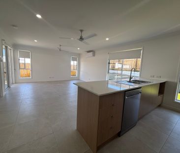 Brand New Four Bedroom Home! - Photo 1