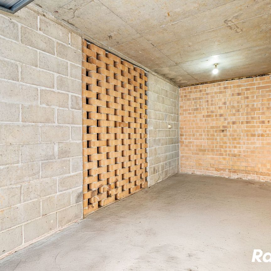 Renovated top-floor unit positioned at the rear of the complex, walk to Top Ryde City - Photo 1