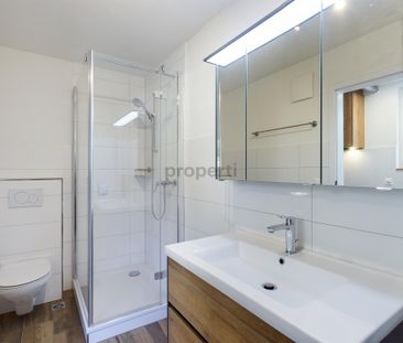 Charmante 2.5-Zimmer Wohnung in ruhigem Einfamilienhaus-Wohnquartier - Photo 3