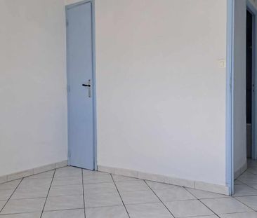 Location - Appartement T4 de 70 m² avec deux balcons et cave - Photo 3