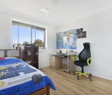 “Four-bedroom family home” - Photo 3